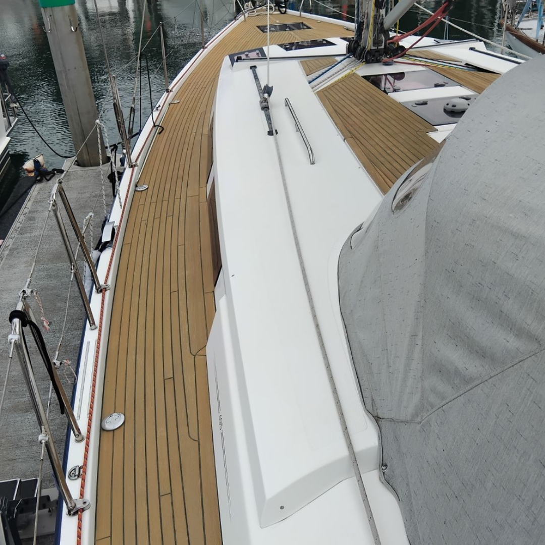 Yacht teak deck which has a fresh protective coat of Semco Natural Teak Sealer for protection against greying