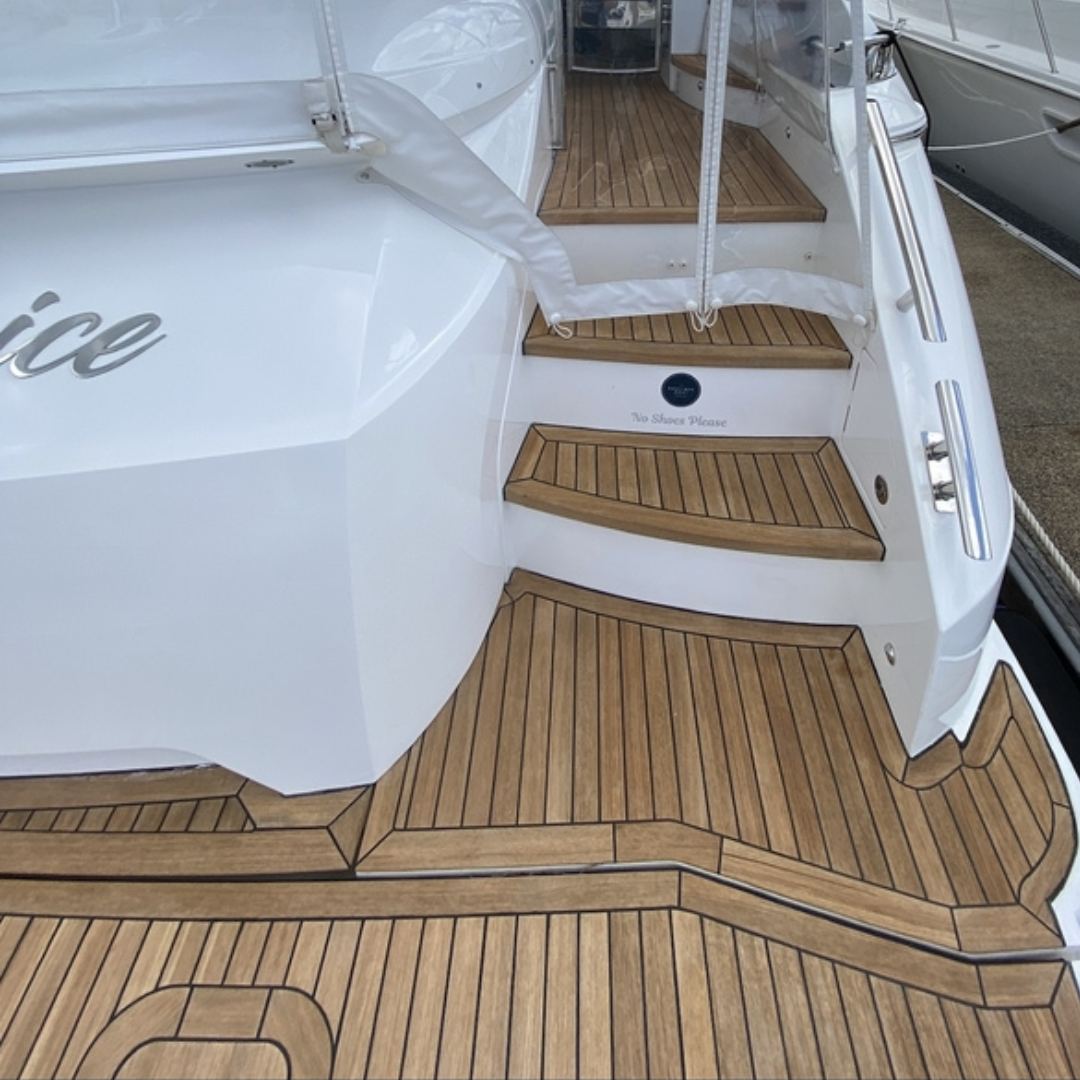 Teak swim platform and aft steps of larger cruise with Semco Cleartone Teak Sealer applied. 