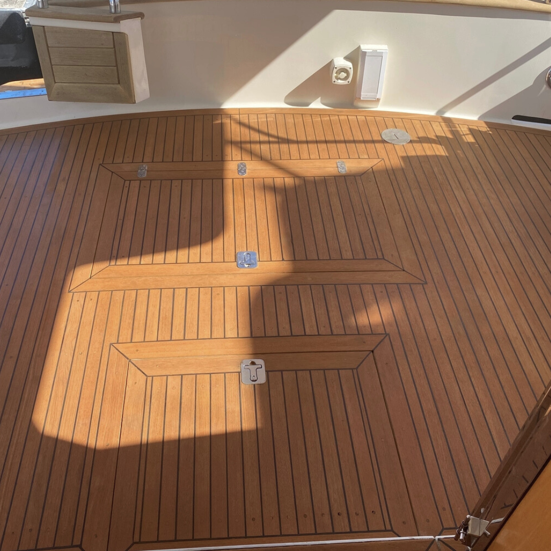 A boats aft deck, which has a new coat of Semco Honeytone Teak Sealer for protection