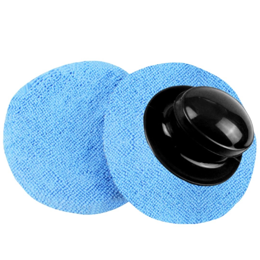 Two blue applicator pads with a black handle, designed for even distribution of teak sealer on large surfaces.